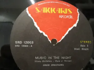Solid Strangers - Music In The Night